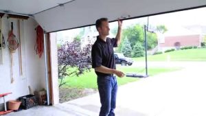 How do I open my garage door manually from the outside?